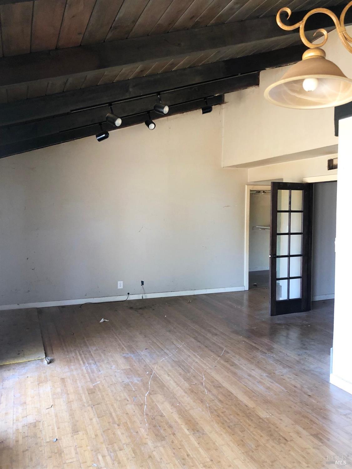 306 Marin Avenue Mill Valley, CA 94941 - Photo 18 of 26 a view of an empty room with windows