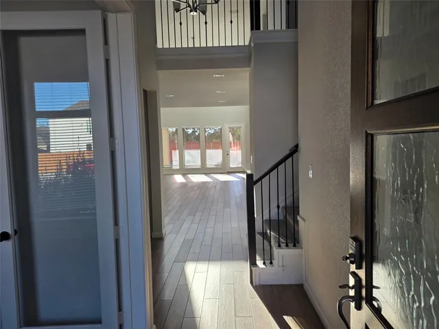 a view of staircase with wooden floor and stairs