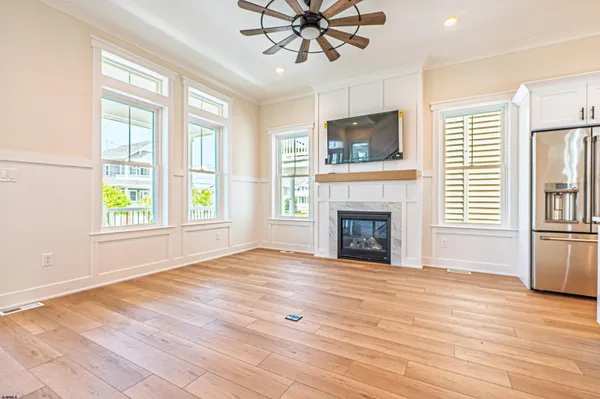 a kitchen with a hard wood floor and a stove
