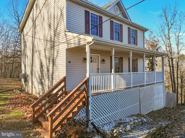 a view of balcony with wooden floor