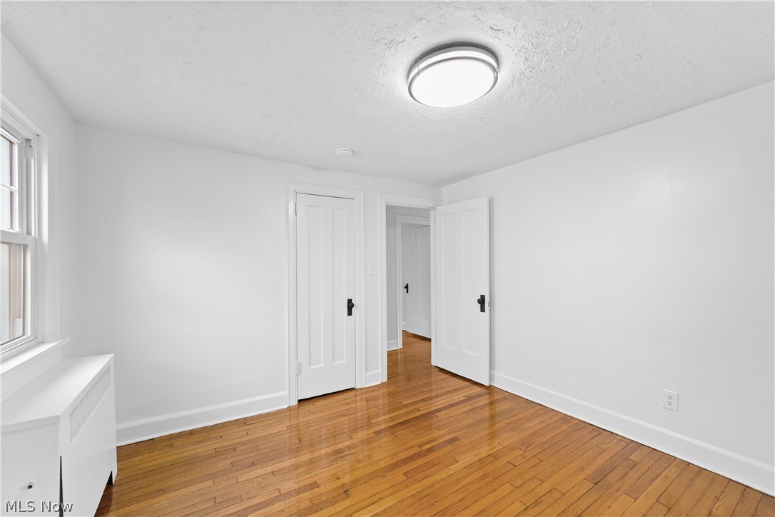 1409 Mayfield Ridge Road Mayfield Heights, OH 44124 - Photo 25 of 40 Bedroom with beautiful hardwood floors
