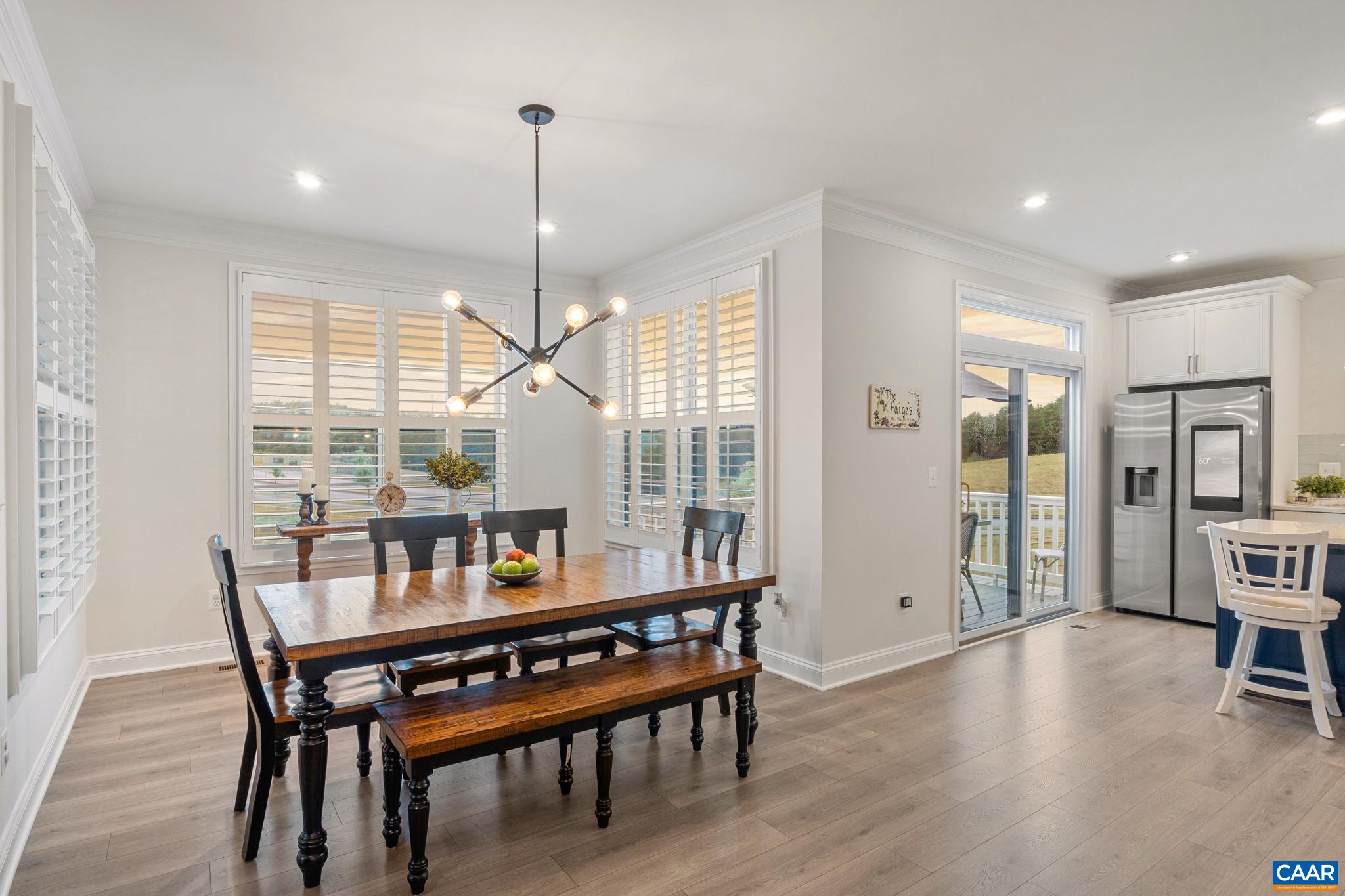 3712 Thicket Run Place Charlottesville, VA 22911 - Photo 15 of 73 a dining room with furniture and window