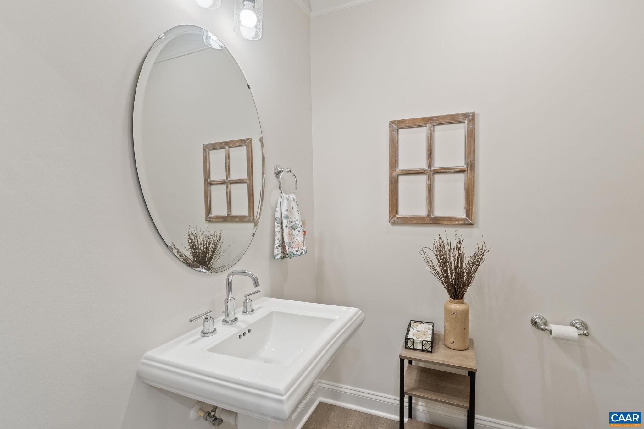 3712 Thicket Run Place Charlottesville, VA 22911 - Photo 26 of 73 a bathroom with a sink and a mirror