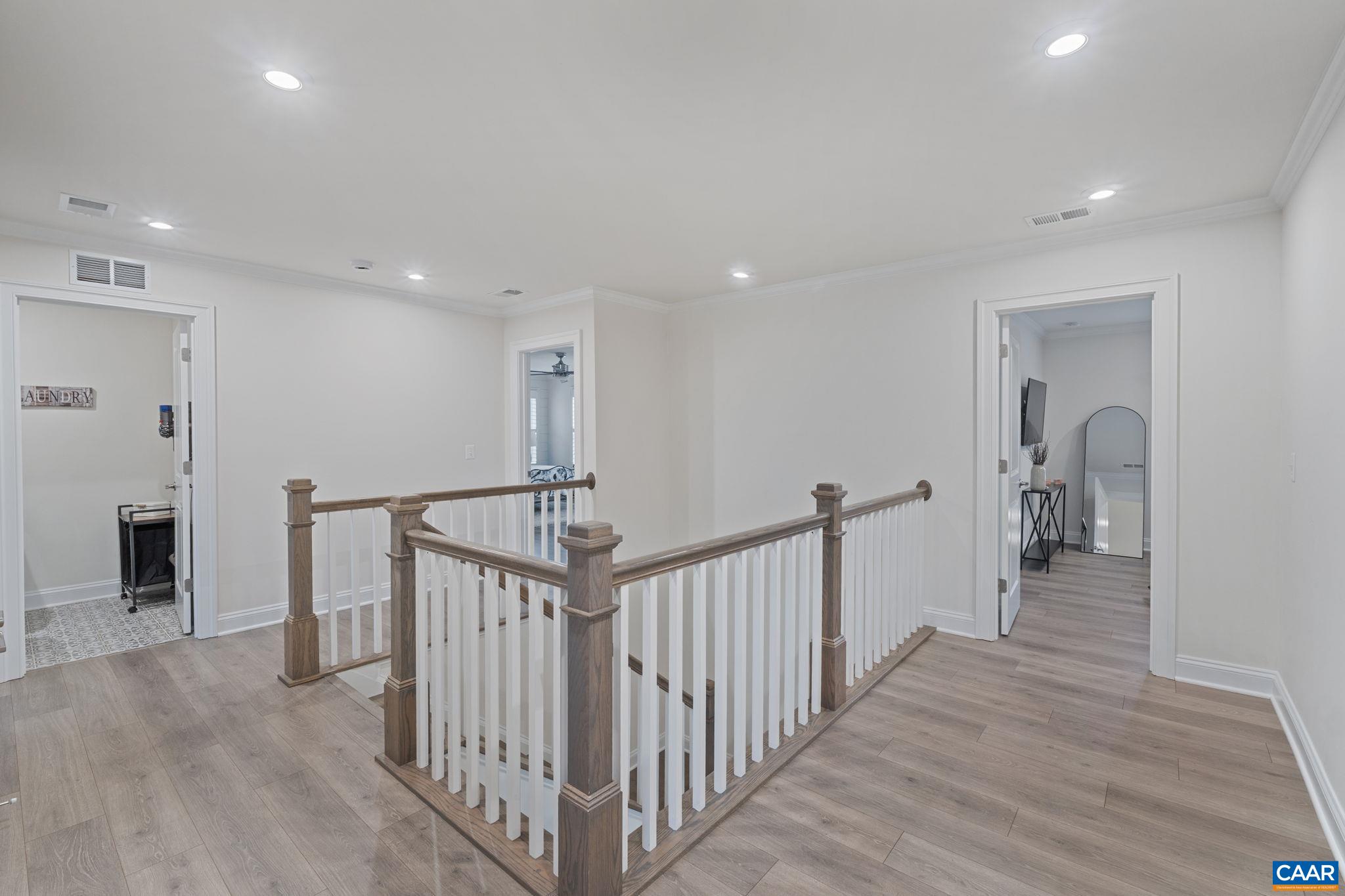 3712 Thicket Run Place Charlottesville, VA 22911 - Photo 34 of 73 a view of a hallway with a livingroom and stairs