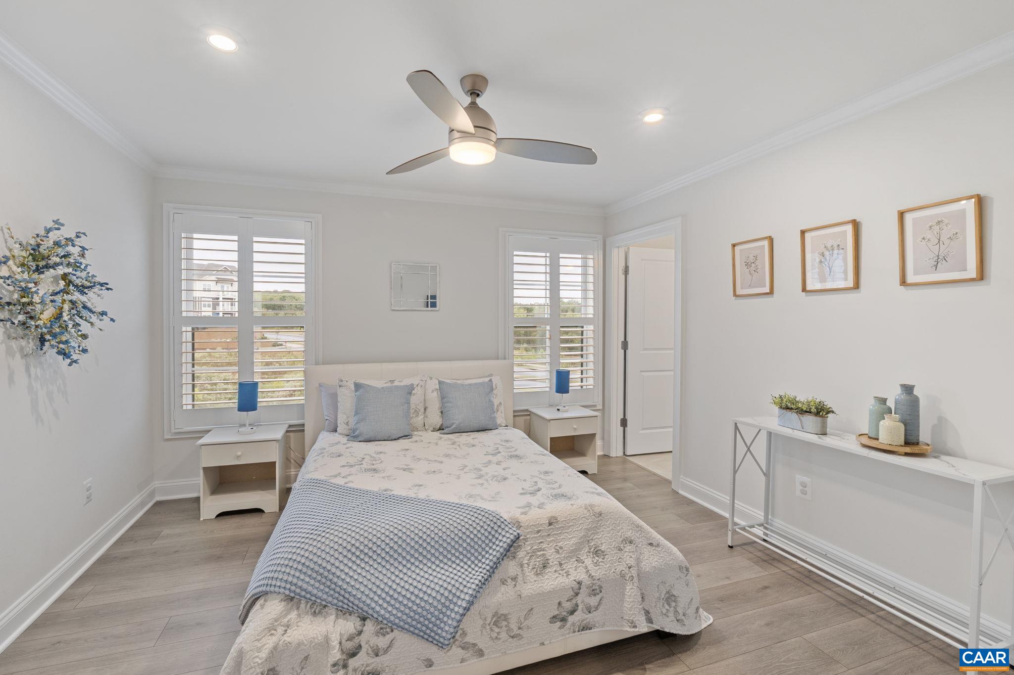 3712 Thicket Run Place Charlottesville, VA 22911 - Photo 36 of 73 a bedroom with a large bed and a window
