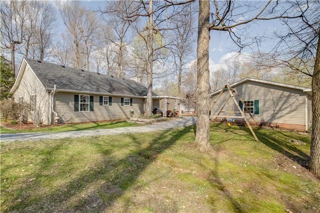 2360 Pleasant View Road Pleasant View, TN 37146 - Photo 15 of 20 Back yard view-swing set/playground stays!