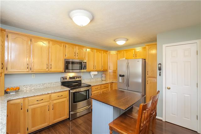 2360 Pleasant View Road Pleasant View, TN 37146 - Photo 6 of 20 Kitchen had a make over with granite and stainless. Lots of counters, cabinets and a separate pantry.