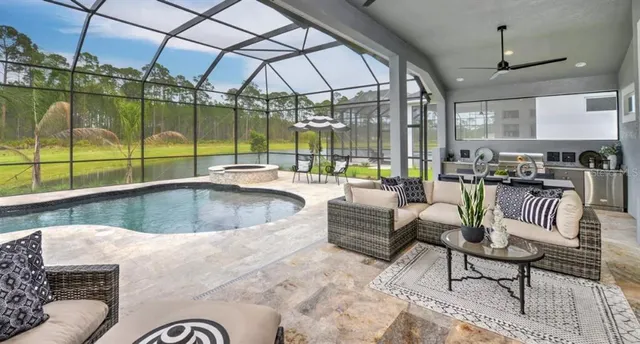 a view of a living room and dining room
