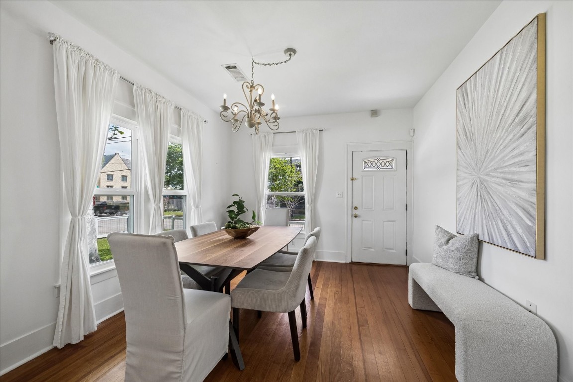 623 Pecore Street Houston, TX 77009 - Photo 6 of 19 a view of a dining room with furniture window and wooden floor