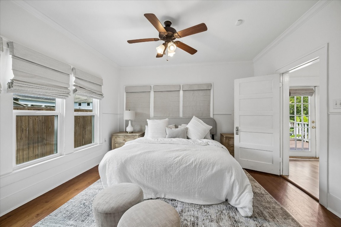 623 Pecore Street Houston, TX 77009 - Photo 9 of 19 a bedroom with a large bed and a window