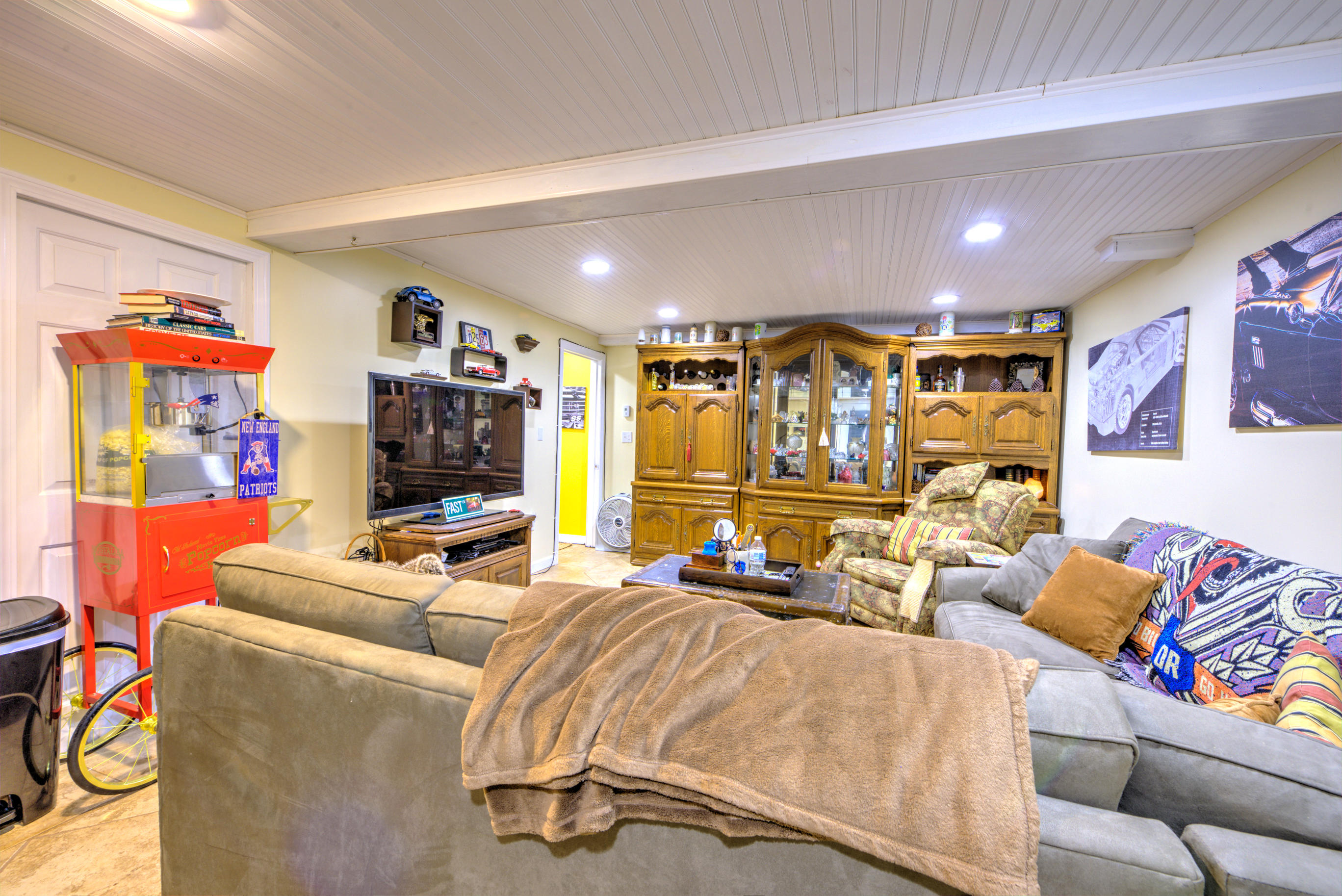 1 Cotuit Road Sandwich, MA 02563 - Photo 12 of 33 a bedroom with furniture and a flat screen tv