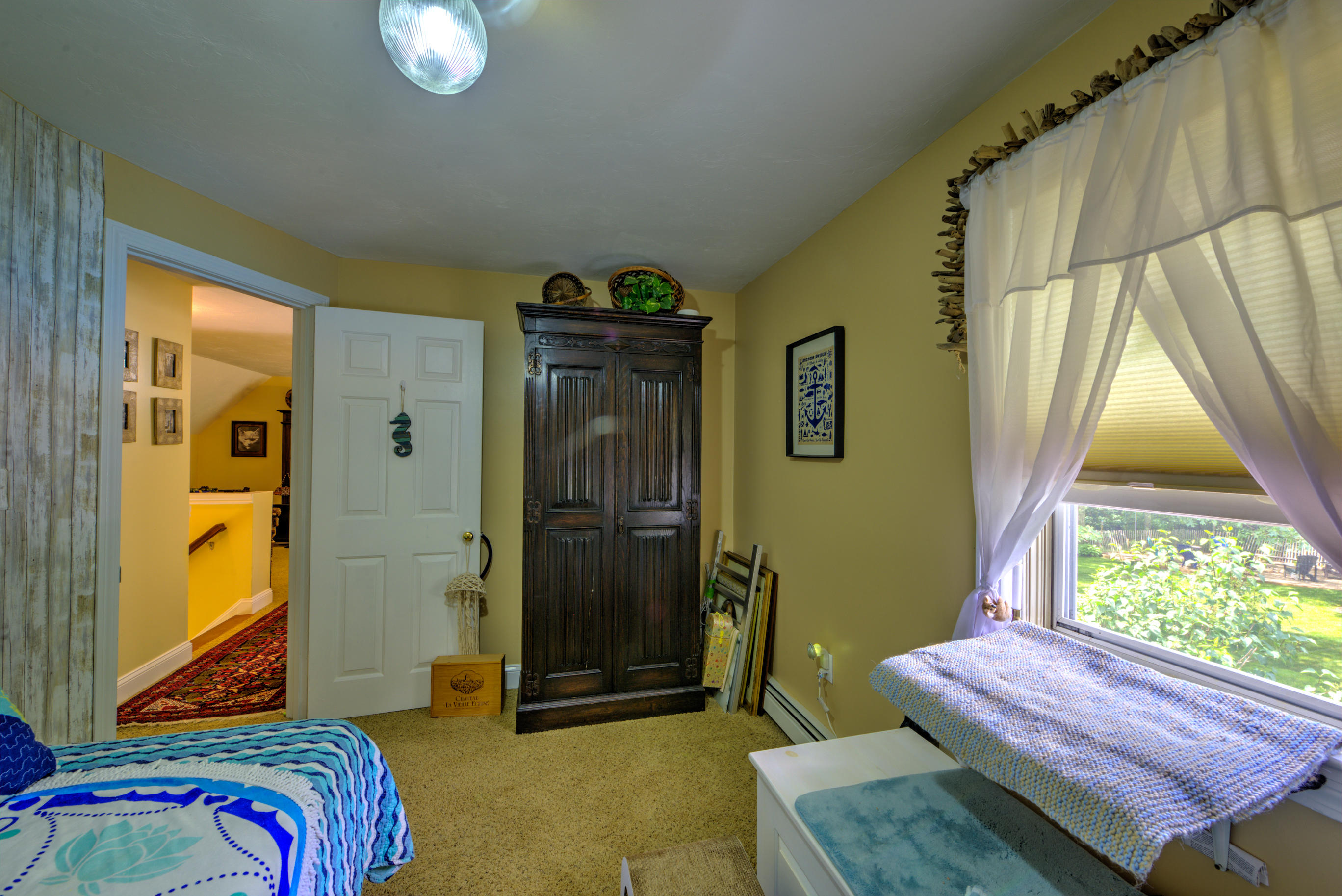 1 Cotuit Road Sandwich, MA 02563 - Photo 14 of 33 a bedroom with a bed and a window