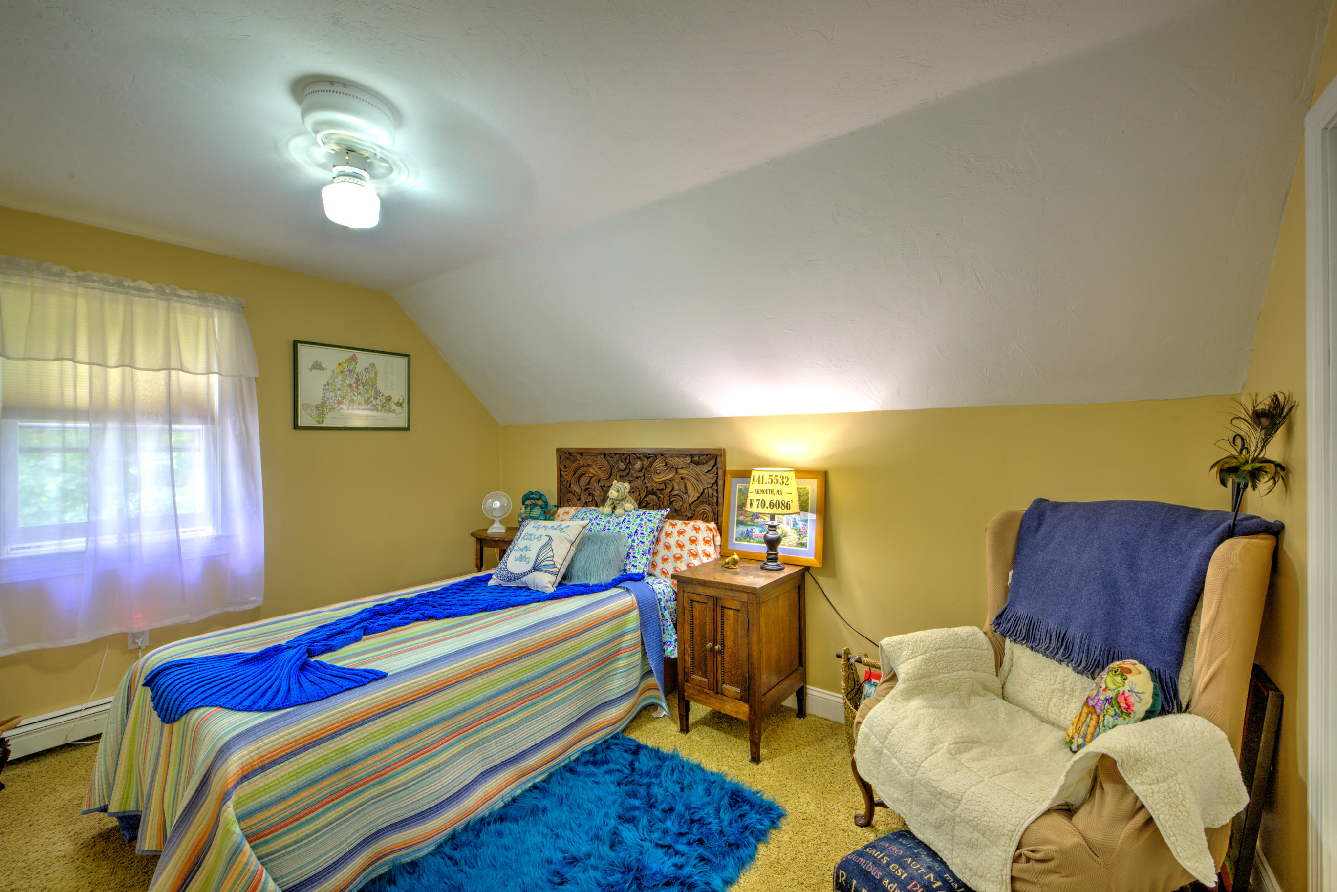 1 Cotuit Road Sandwich, MA 02563 - Photo 15 of 33 a bed room with a bed chair and a lamp