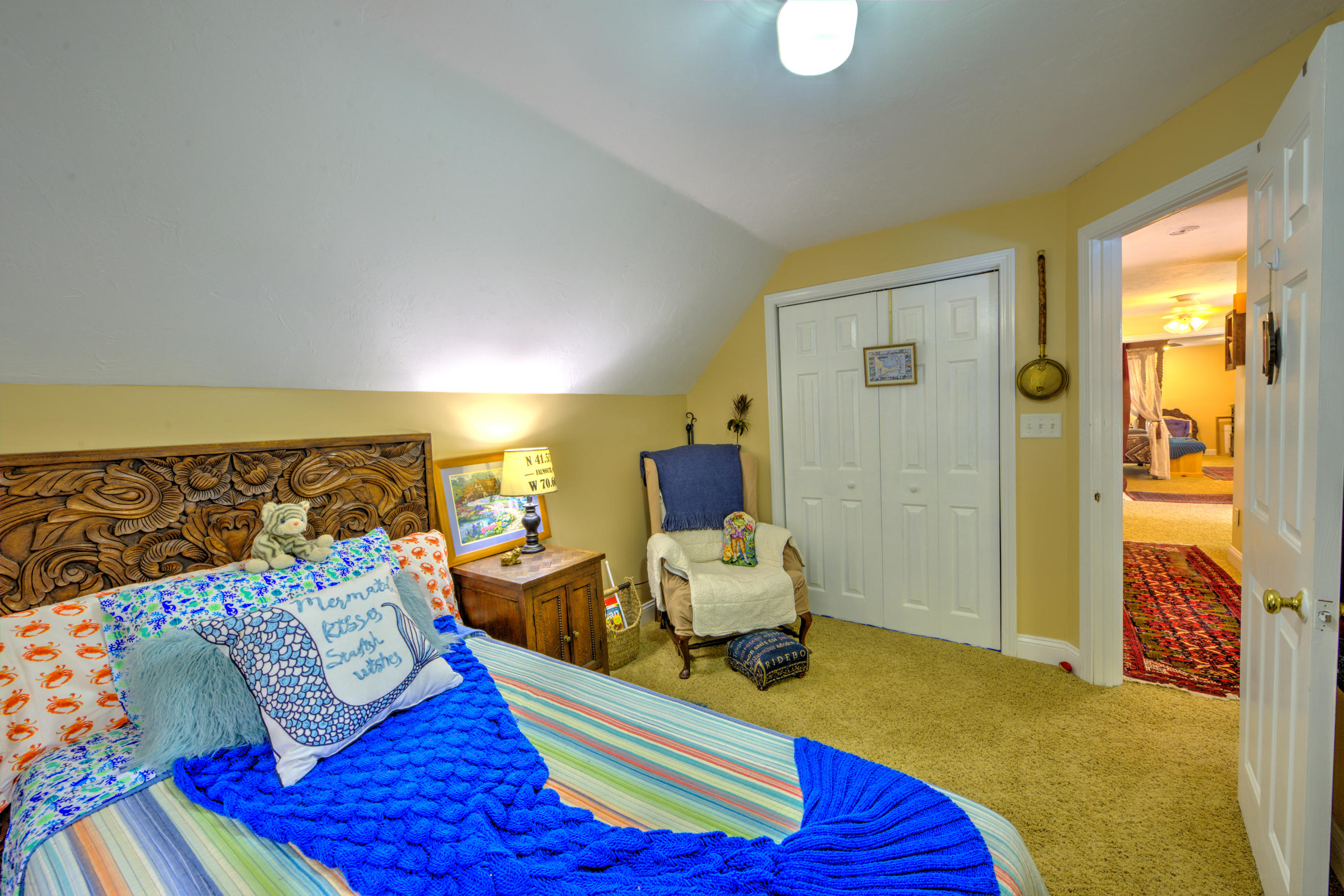 1 Cotuit Road Sandwich, MA 02563 - Photo 16 of 33 a bedroom with a bed and wooden floor