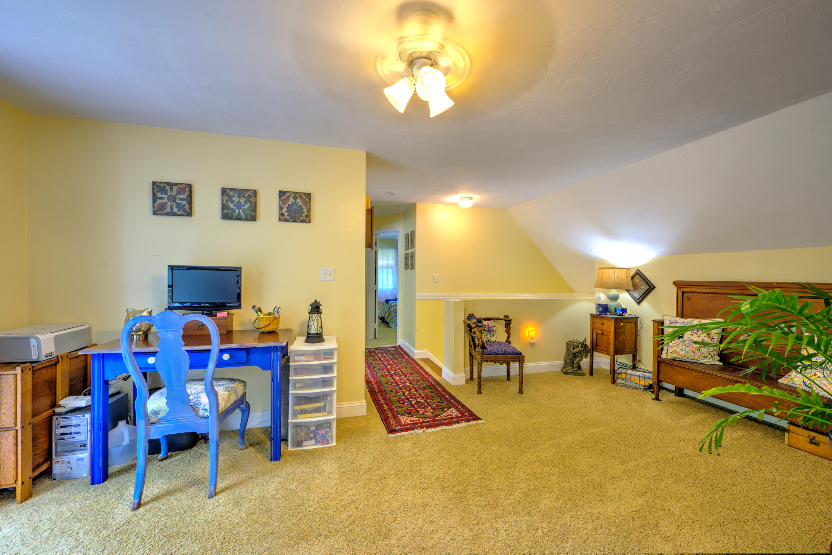 1 Cotuit Road Sandwich, MA 02563 - Photo 20 of 33 a living room with lots of furniture and a chandelier
