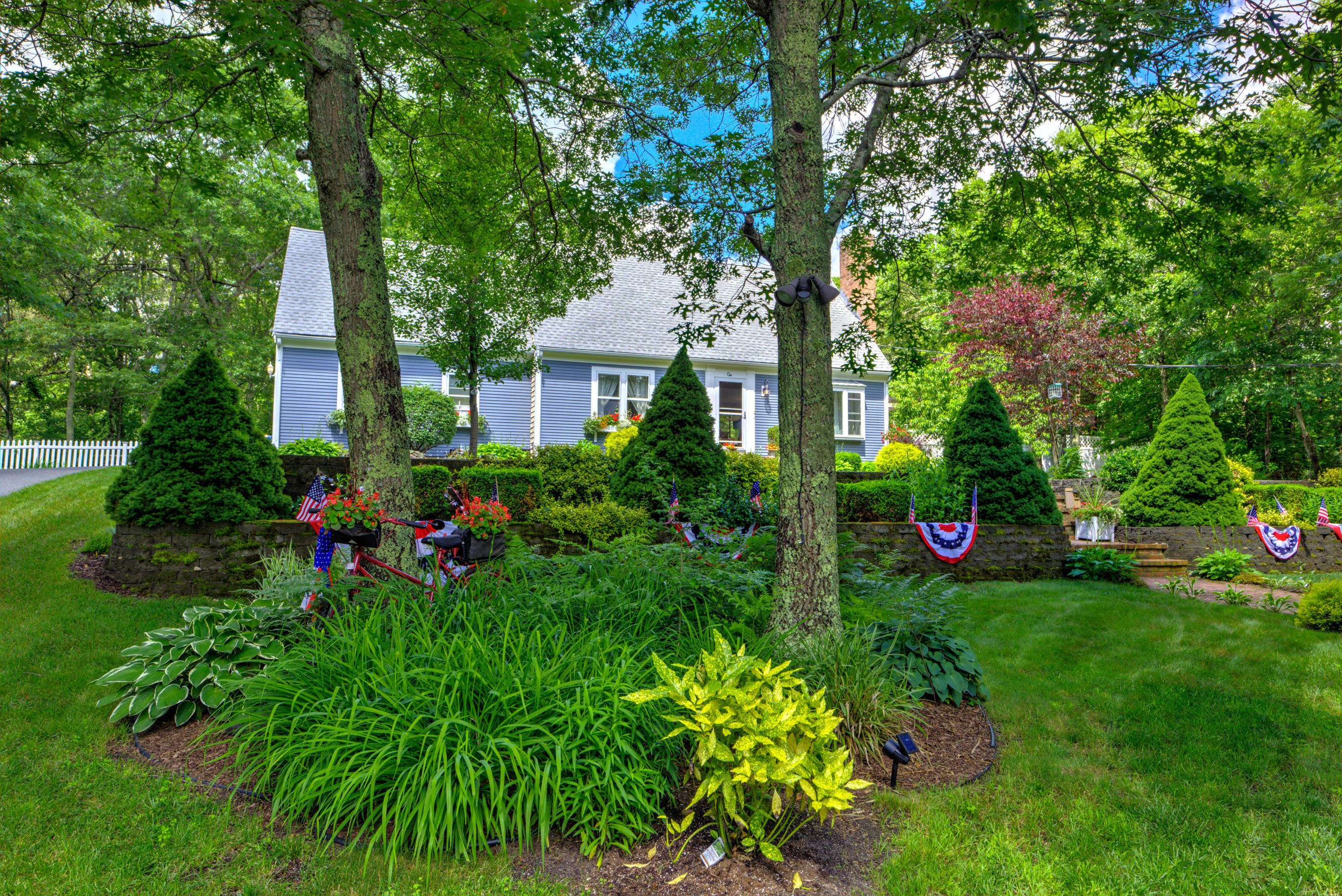 1 Cotuit Road Sandwich, MA 02563 - Photo 2 of 33 a view of a house with a yard and garden