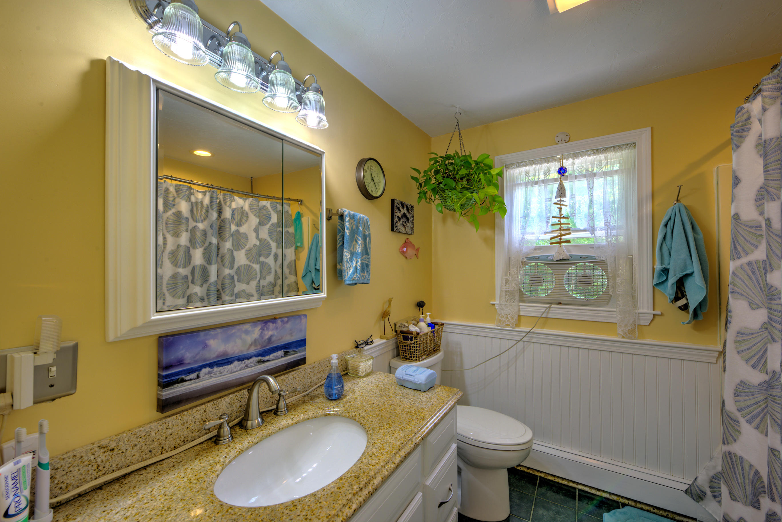 1 Cotuit Road Sandwich, MA 02563 - Photo 22 of 33 a bathroom with a granite countertop toilet sink and mirror