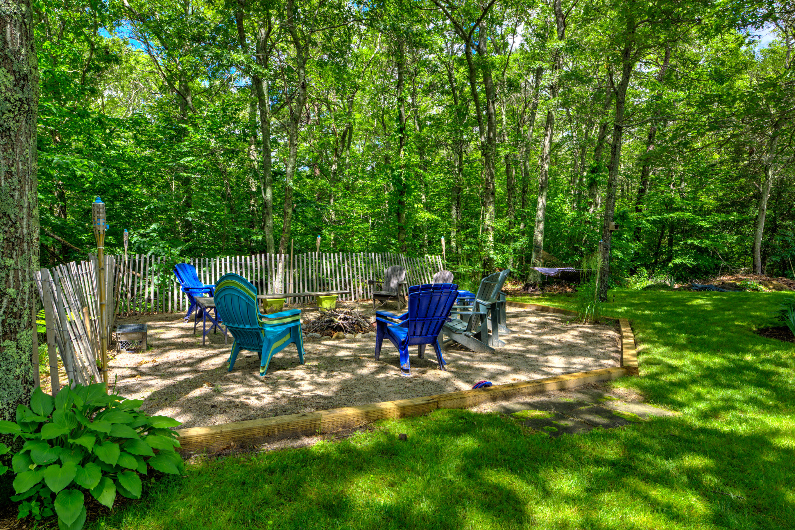 1 Cotuit Road Sandwich, MA 02563 - Photo 30 of 33 a view of a chairs in a backyard
