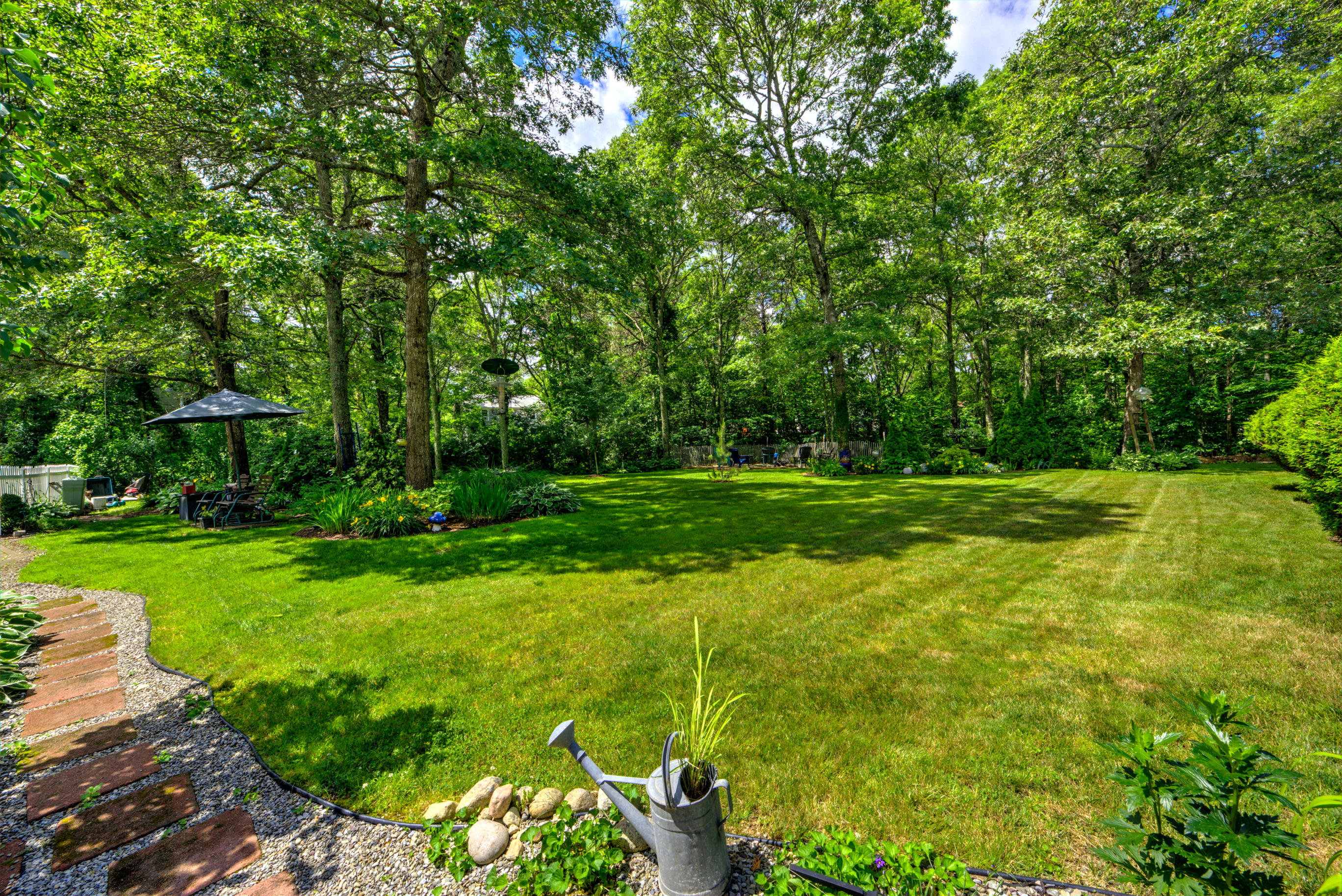 1 Cotuit Road Sandwich, MA 02563 - Photo 32 of 33 a view of a golf course with a garden