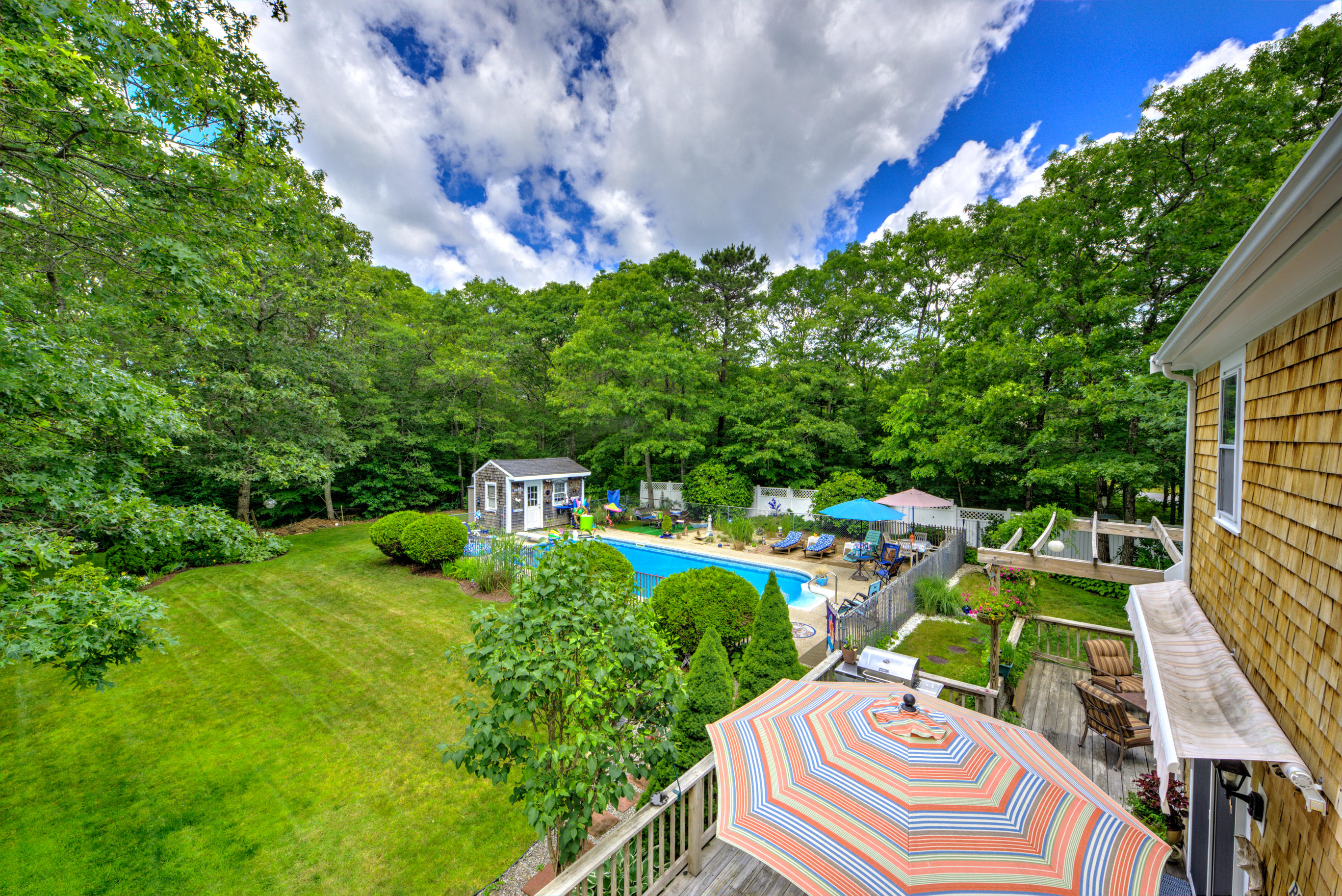 1 Cotuit Road Sandwich, MA 02563 - Photo 33 of 33 a view of a chairs and table in a patio