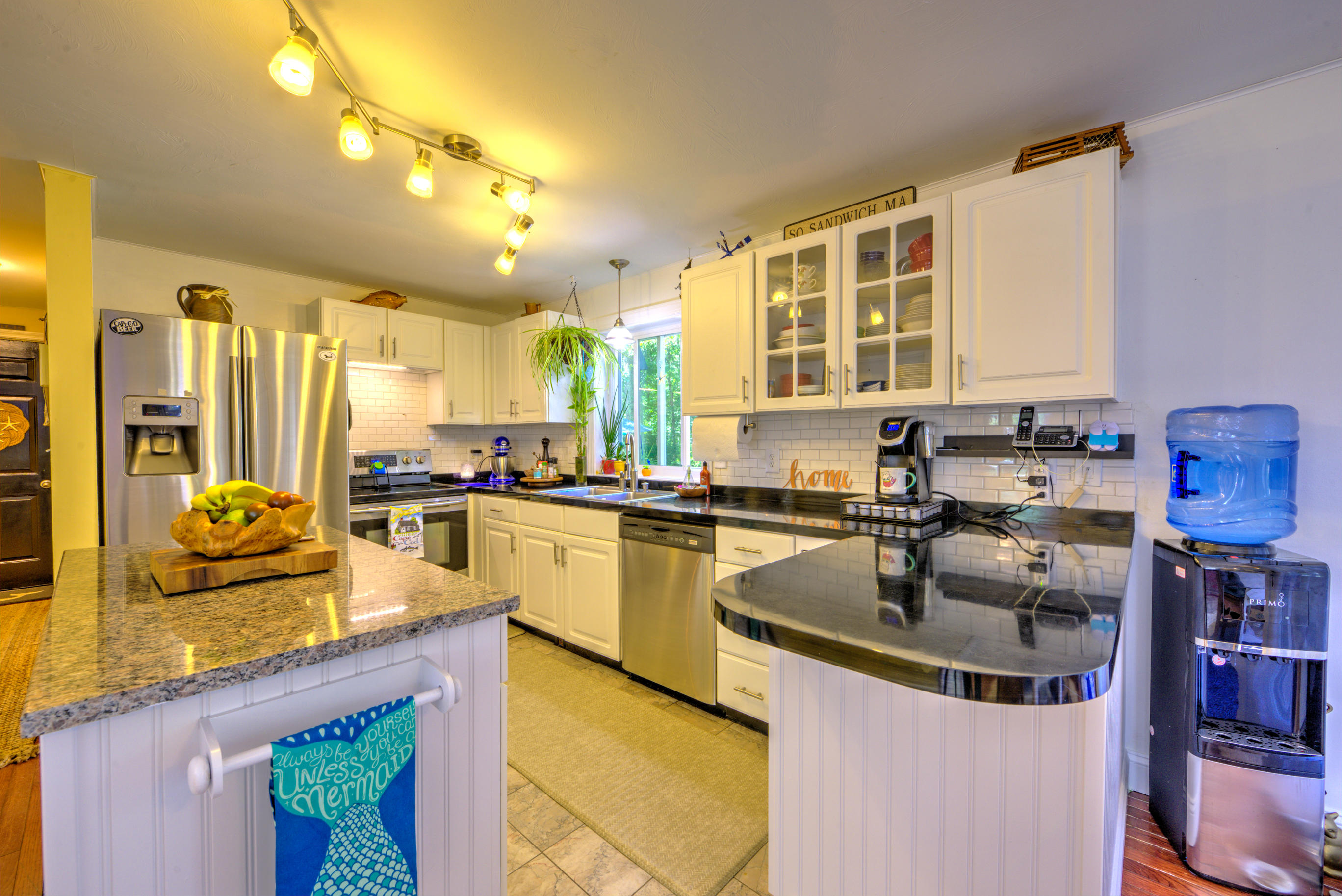 1 Cotuit Road Sandwich, MA 02563 - Photo 5 of 33 a kitchen with kitchen island granite countertop a sink and counter space
