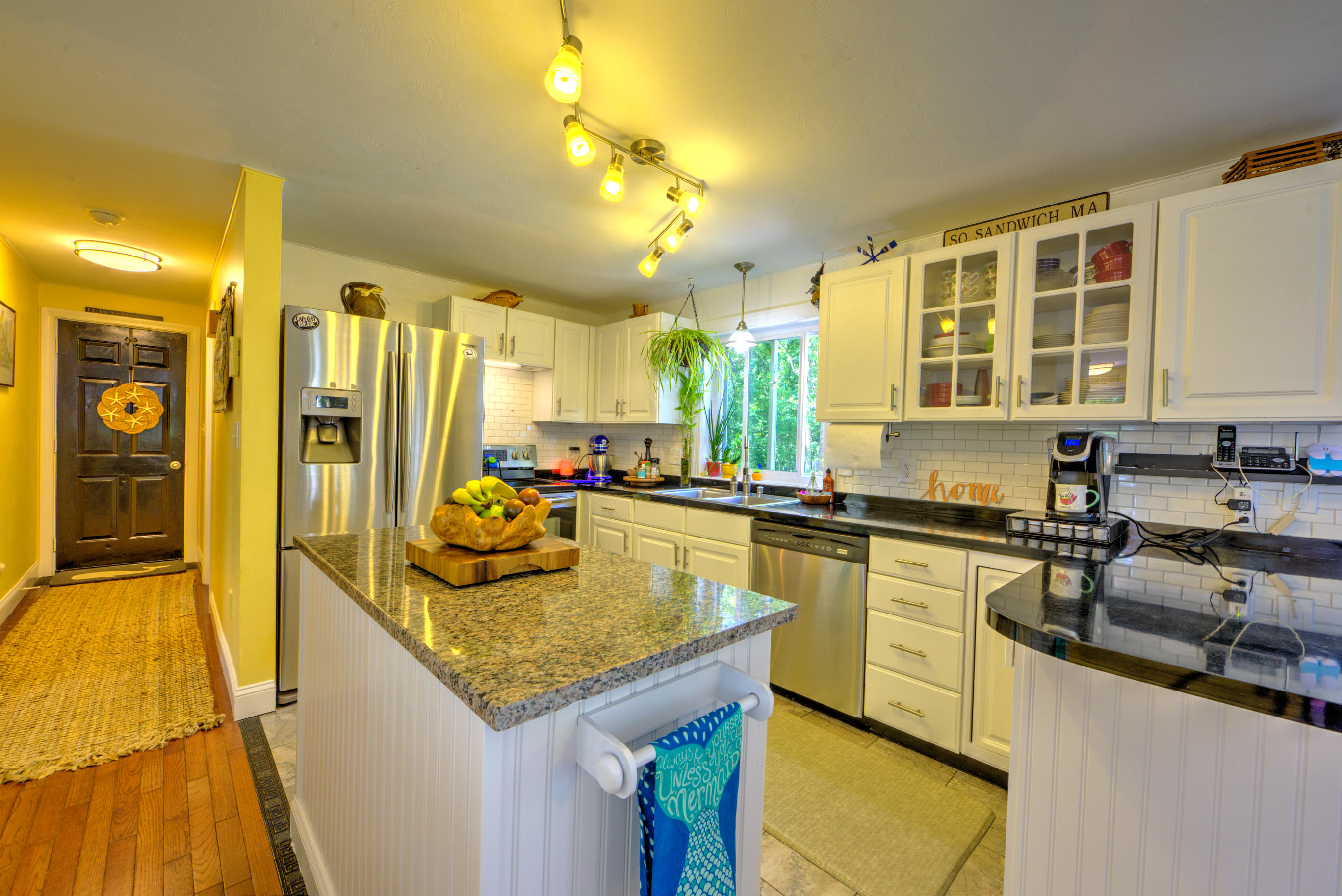 1 Cotuit Road Sandwich, MA 02563 - Photo 9 of 33 a kitchen with sink refrigerator and stove