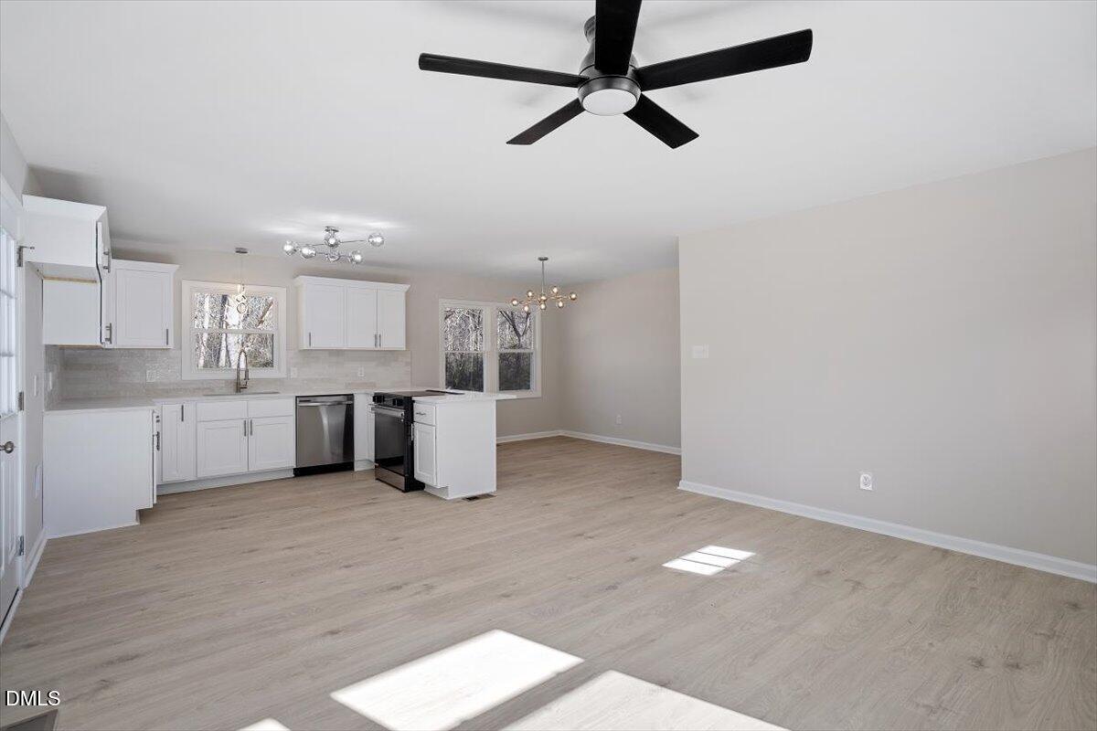 5326 Salem Church Road Graham, NC 27253 - Photo 11 of 20 a view of a kitchen with a sink cabinets and window