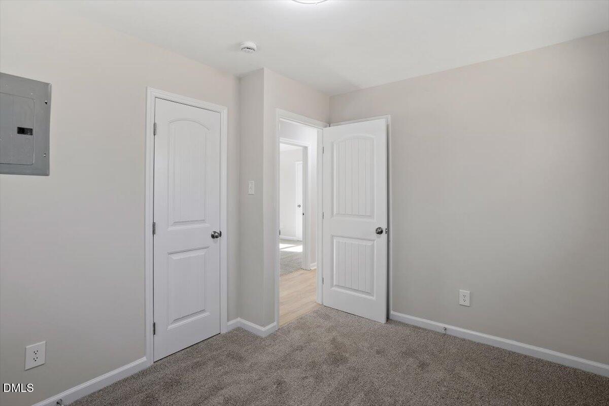 5326 Salem Church Road Graham, NC 27253 - Photo 15 of 20 an empty room with closet area