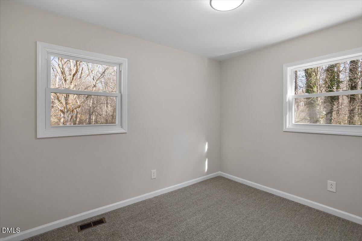 5326 Salem Church Road Graham, NC 27253 - Photo 19 of 20 an empty room with a window