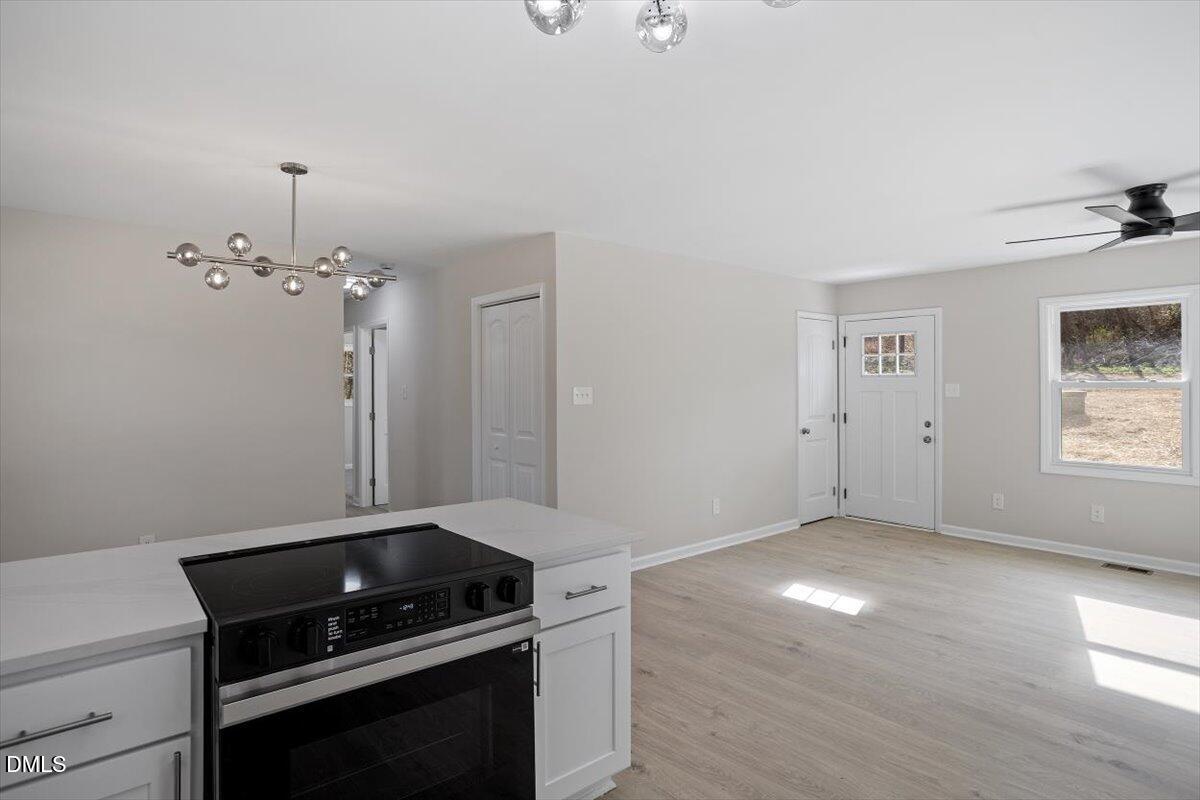 5326 Salem Church Road Graham, NC 27253 - Photo 8 of 20 a kitchen with a stove and a window