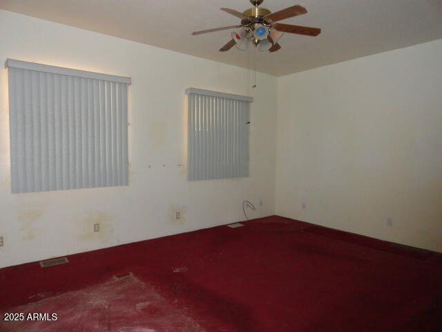 8279 East Larson Road Hereford, AZ 85615 - Photo 11 of 22 an empty room with a window