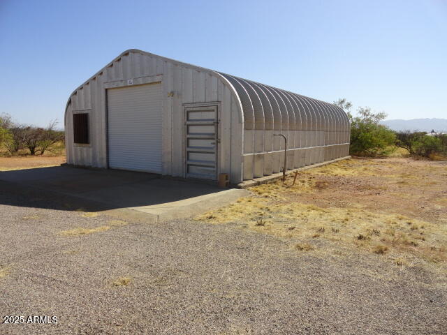 8279 East Larson Road Hereford, AZ 85615 - Photo 2 of 22 a view of backyard of house