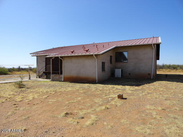 8279 East Larson Road Hereford, AZ 85615 - Photo 22 of 22 a backyard of a house