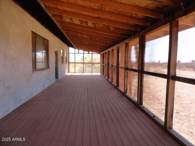 8279 East Larson Road Hereford, AZ 85615 - Photo 6 of 22 a view of entryway with wooden floor