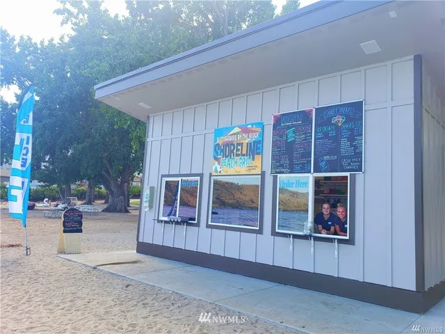 a backyard of a house with seating space