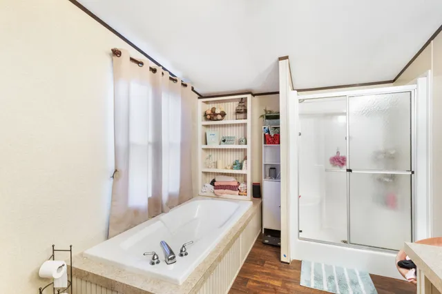 a view of a backyard with table and chairs