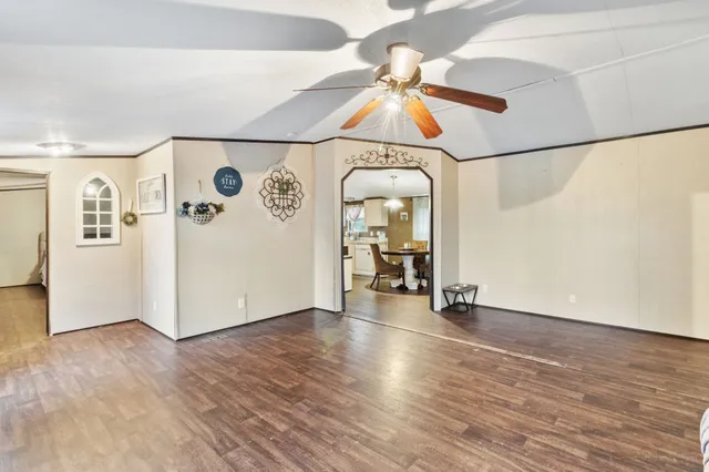 a view of a livingroom with wooden floor