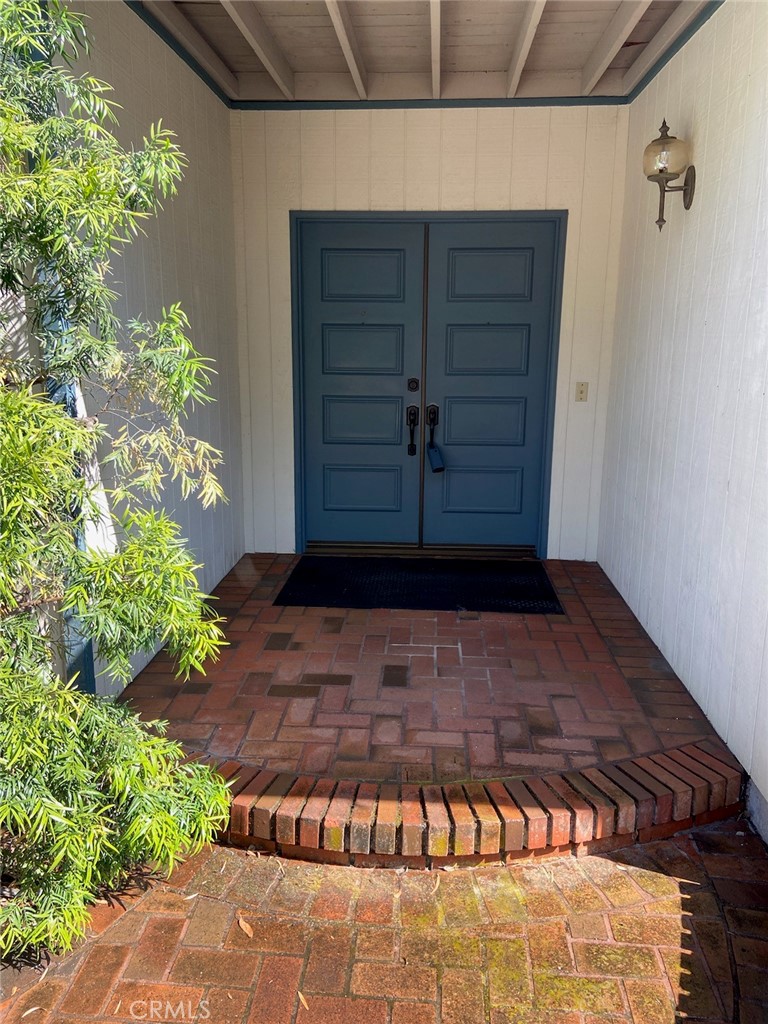 22332 Fallen Leaf Road Lake Forest, CA 92630 - Photo 1 of 33 a view of a wooden door