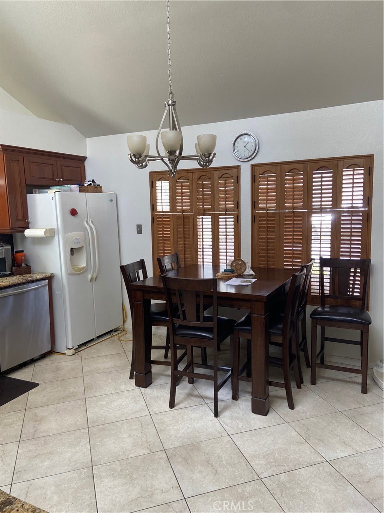 22332 Fallen Leaf Road Lake Forest, CA 92630 - Photo 15 of 33 a view of a dining room with furniture