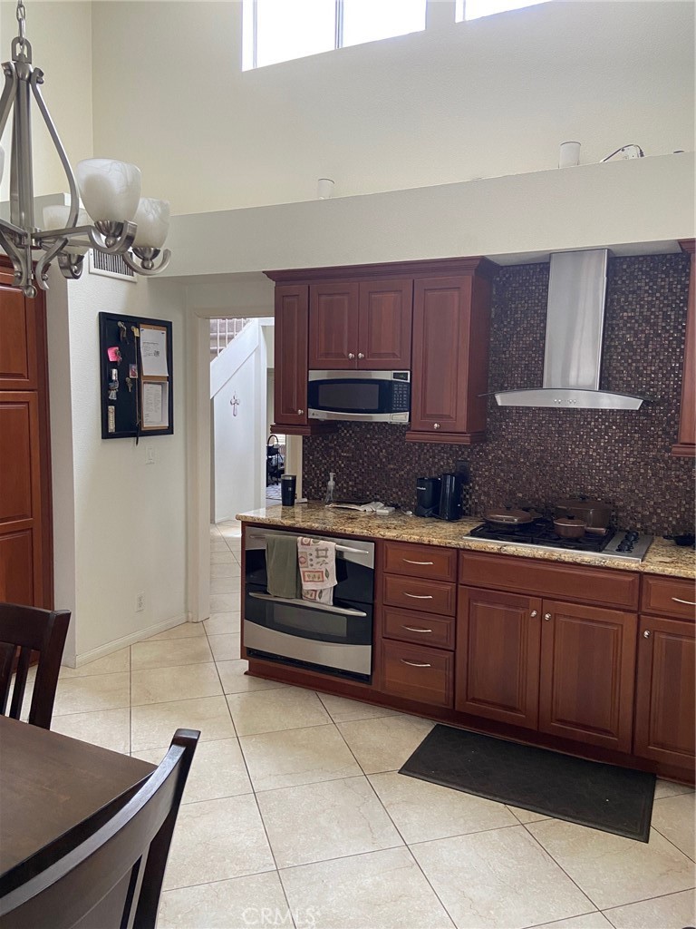 22332 Fallen Leaf Road Lake Forest, CA 92630 - Photo 19 of 33 a kitchen with a sink and cabinets