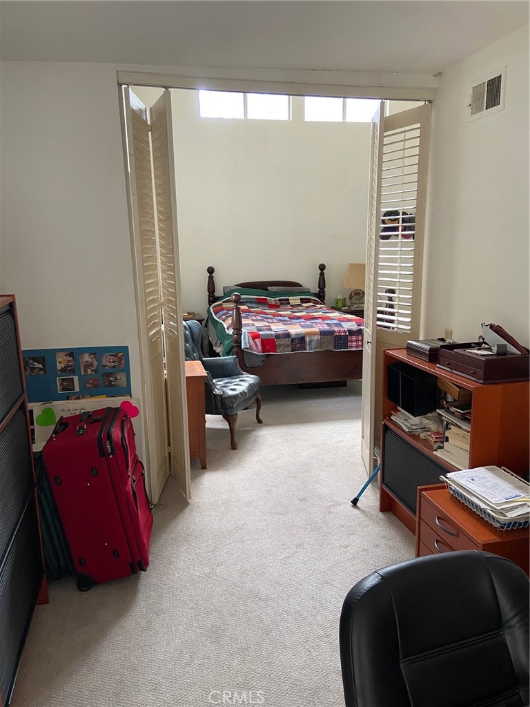 22332 Fallen Leaf Road Lake Forest, CA 92630 - Photo 24 of 33 a bedroom with furniture and a window