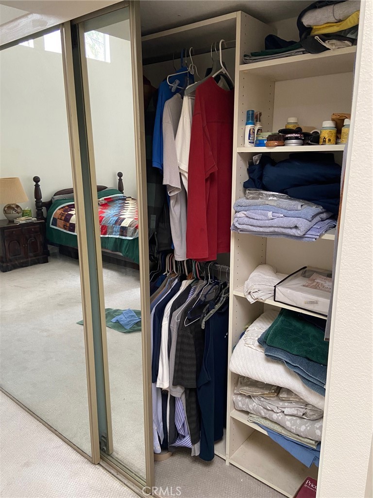 22332 Fallen Leaf Road Lake Forest, CA 92630 - Photo 29 of 33 a view of walk in closet with clothes and shoes