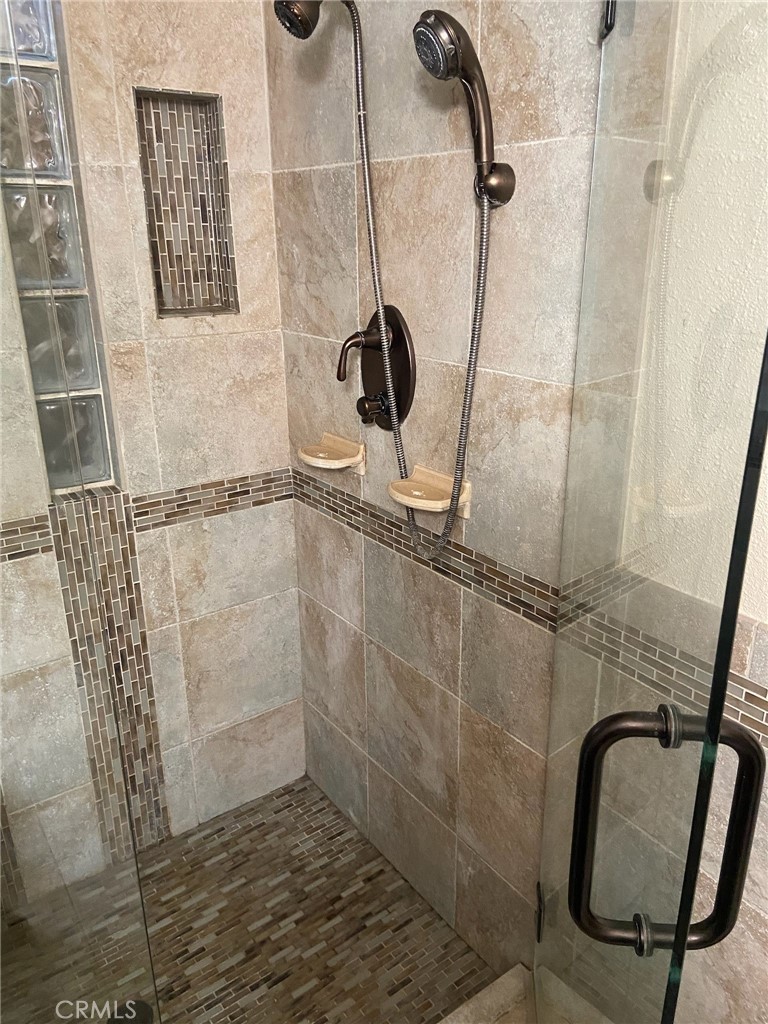 22332 Fallen Leaf Road Lake Forest, CA 92630 - Photo 4 of 33 a bathroom with a shower