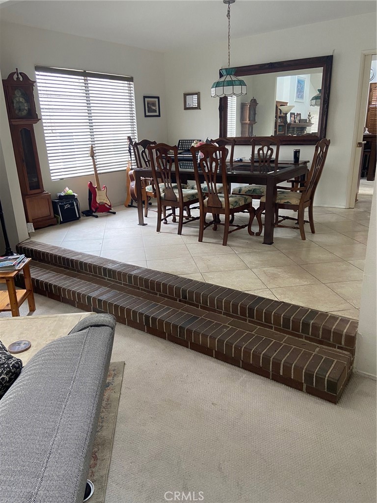 22332 Fallen Leaf Road Lake Forest, CA 92630 - Photo 6 of 33 a dining room with furniture and a window