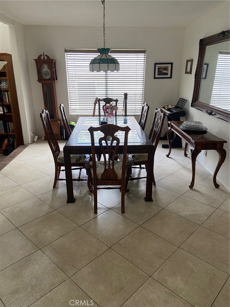 22332 Fallen Leaf Road Lake Forest, CA 92630 - Photo 8 of 33 a view of a dining room with furniture