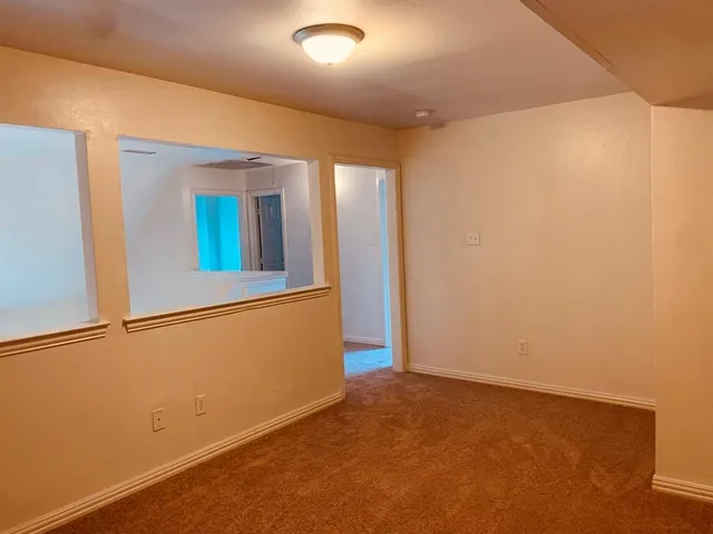 an empty room with window