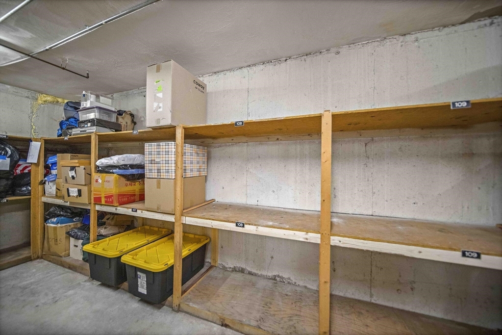 50 Green Street, Unit 108 Brookline, MA 02446 - Photo 17 of 22 a room with gym equipment