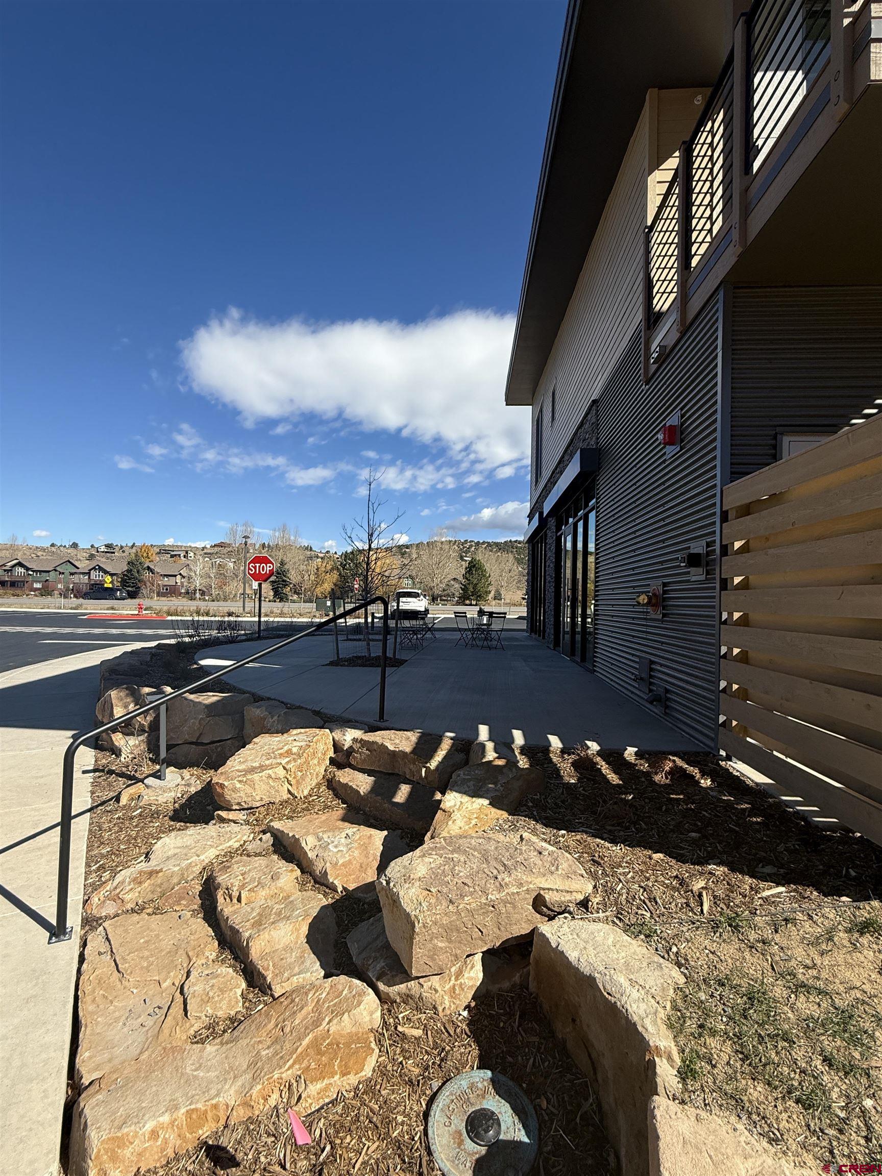 205 Jasper Lane, Unit 104 Ridgway, CO 81432 - Photo 28 of 34 a view of a terrace with wooden floor