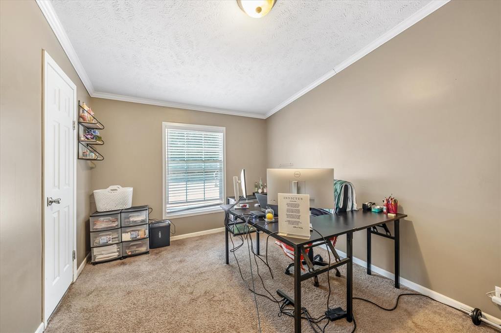 13902 East Travis Lane Log Cabin, TX 75148 - Photo 12 of 24 a workspace with furniture and a window