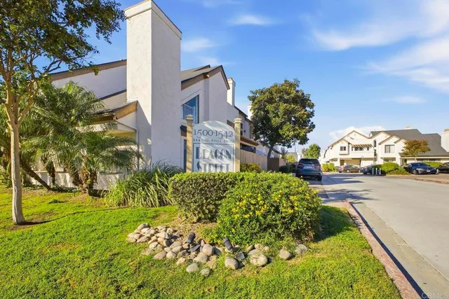 a view of a city street from a building